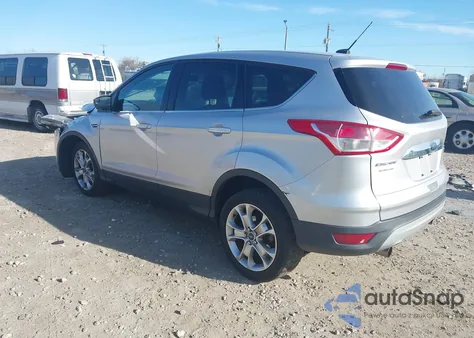 2013 Ford Escape Sel z USA, uszkodzony, nr VIN 1FMCU9HX4DUD40365